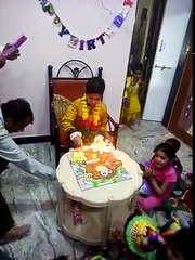 fire on little boy hair while clebrating his birthday party