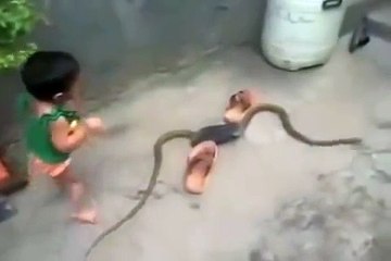 little kids with a big snake