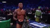 Randy Orton takes a moment to eat Christmas cookies