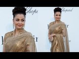 Cannes 2013: Aishwarya Rai Bachchan Dazzles In Gold At amfAR Gala
