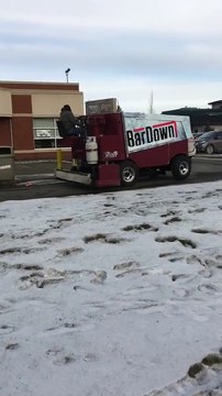 Guy drives Zamboni through the Tim Horton's Drive Thru