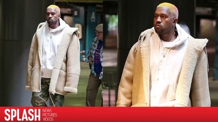 Kanye West Catches a Movie With Pink Hairdo