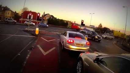 Jaguar driver with road rage takes it out on cyclist