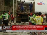 QRT: Sangkaterbang basurang inanod ng malalakas na alon, patungong Manila Bay, hinakot