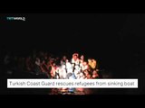 TRT World - Turkish Coast Guard rescues refugees from sinking boat