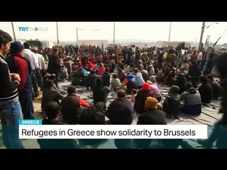 Refugees in Greece show solidarity to Brussels attacks