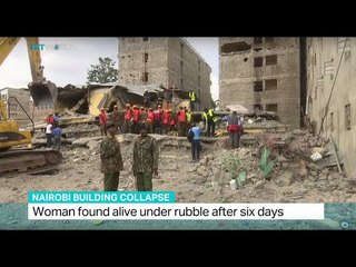 Woman found alive under rubble after six days