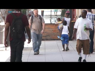 Dallas shooter's actions shock city hoping for peace, Colin Campbell reports