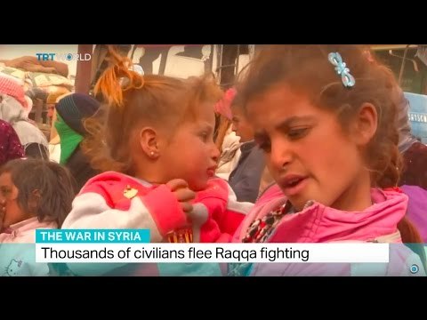 The War In Syria: Thousands of civilians flee Raqqa fighting