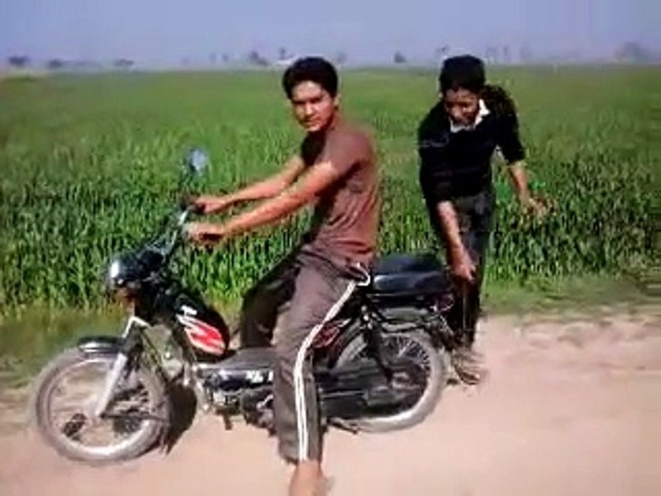 Verry funny local boys  bike stunt