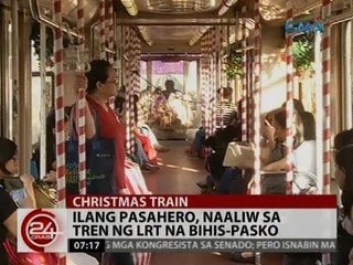 24 Oras: Ilang pasahero, naaliw sa tren ng LRT na bihis-Pasko