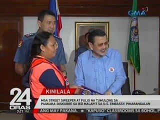 Street sweepers at pulis na tumulong sa pagdiskubre sa ied malapit sa U.S. Embassy, pinarangalan