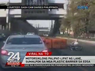 Motorsiklong palipat-lipat ng lane,   sumalpok sa mga plastic barrier sa EDSA