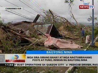 Mga sira-sirang bahay at mga nagtumbahagang poste at puno, iniwan ng Bagyong Nina