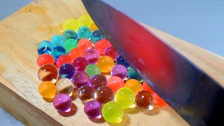 EXPERIMENT Glowing 1000 degree KNIFE VS ORBEEZ BALLS - YouTube