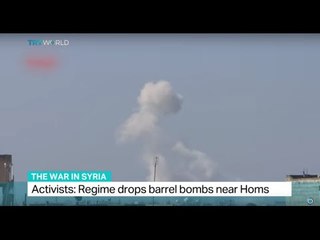 Activists say regime drops barrel bombs near Homs