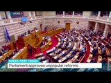 Greek parliament approves unpopular reforms, Nicolas Morgan reports
