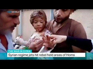 下载视频: The War In Syria: Syrian regime jets hit rebel held areas of Homs, Sourav Roy reports