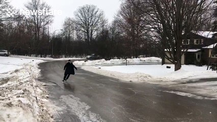 Canadians make the most of icy roads by skating on them