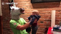 Father wears 'mystical unicorn' head mask for a whole day