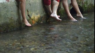 Feet in the river