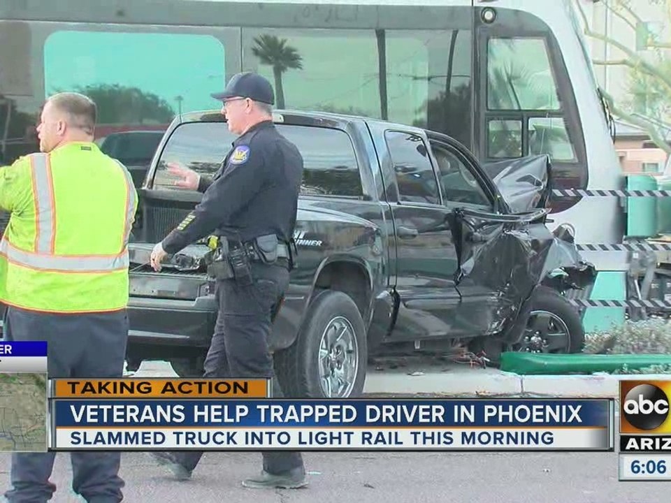 Veterans help driver trapped after crash with light rail