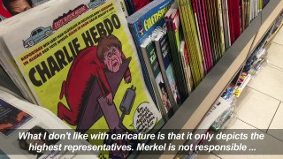 Mixed response as French satire mag Charlie Hebdo hits Germany-re29HlLkflA