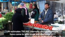 In rebel-held Idlib, displaced Syrians bemoan 'open-air prison'-_9-FbRaBP5U