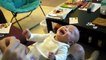 COMEDY VIDEOS _ FUNNU BABIES - A child laughs at the sound of torn paper-4AiixkUY8mk