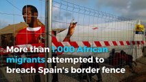 More than 1K African migrants attempt to cross Span's borders