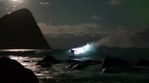 Pro-surfer Mick Fanning surfs under Northern Lights in Norway