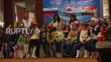 Russian Troops in Syria Handout Christmas Gifts to School Kids