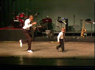 Tap dance showdown between toddler and seasoned pro