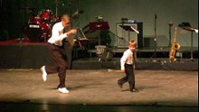 Tap dance showdown between toddler and seasoned pro