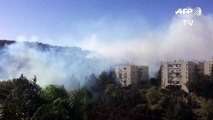 Hundreds evacuated as bushfires near Israel's Haifa-TOGXFggV020