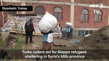 People in Turkey's Diyarbakir collect aid for Aleppo refugees[1]