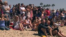 Surf's up at annual dog surfing day in Huntington Beach