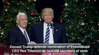 Trump defends diplomat pick Tillerson against critics[1]