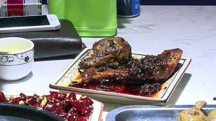 Spicy marinated rabbit heads -- a hit in China's Sichuan[1]