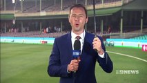Reporter caught in torrential rain at the SCG during live cross _ Daily Mail Online