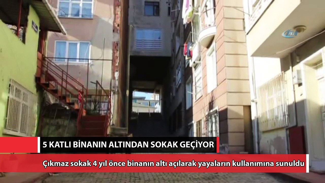 5 katlı binanın altından sokak geçiyor
