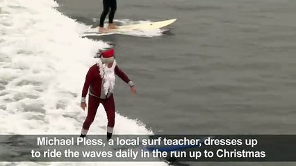 In California, Santa trades his sleigh for a surf board