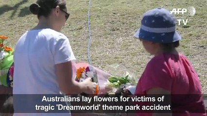Australians lay flowers for victims of theme park accident
