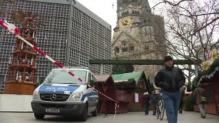 People pay tribute at Berlin Christmas market after attack