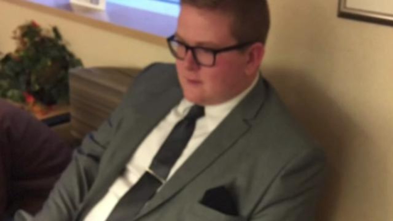 The Awesome Reason This Guy Wore a Suit to the...