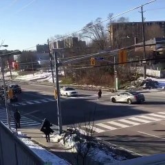 Lady Jumps on Police Car and Tries to Break Windshield