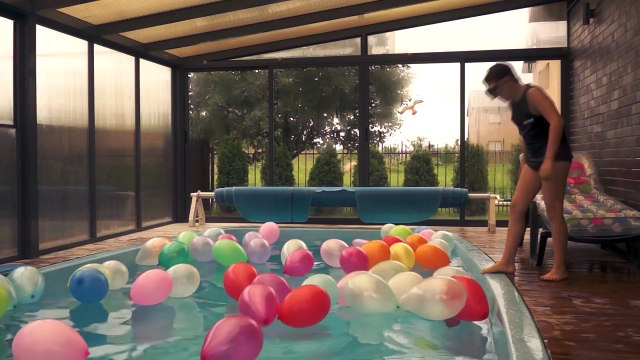 Balloon Pool Fun with Water Balloons and Huge Surprise Rainbow Balloon POP