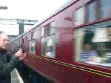 The No. 60103 'Flying Scotsman' in Winter Cumbrian Mountain Express arriving at Carlisle.