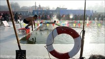 Chinese swimmers brave freezing waters at ice and snow festival