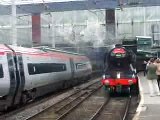 The No. 60103 'Flying Scotsman' and Virgin Trains Pendolino at the Carlisle Rail Station.